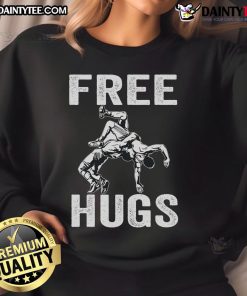 Funny wrestling sweatshirt featuring humor and a 'Free Hugs' design, perfect for wrestling fans and casual wear.