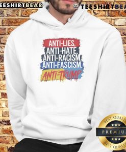 Alt Text: Person wearing a Good Anti-Hate hoodie at a protest against racism and fascism during a Trump rally.