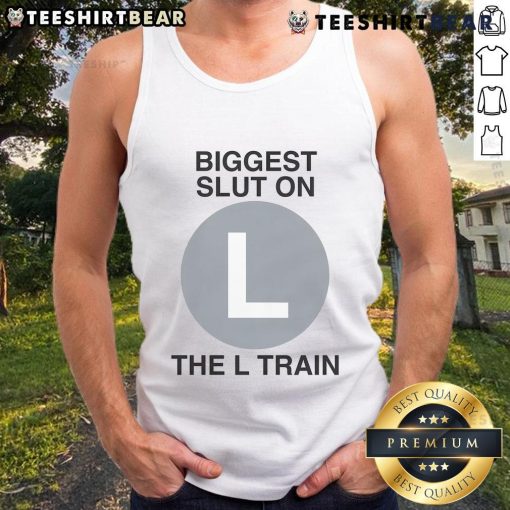 Model wearing 'Good Biggest Slut on the L Train' tank top, showcasing vibrant design and urban style on the subway.