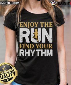 Fit woman jogging in a 'Good Enjoy The Run' tee, showcasing an active lifestyle and the joy of running.