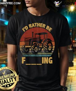 Good I'd Rather Be Farming Farmer Joke T-Shirt featuring a farmer with a tractor, perfect for agriculture enthusiasts.