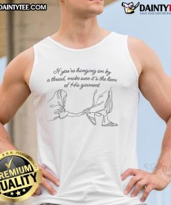 Tank top with the phrase 'Good If You're Hanging On By A Thread, Make Sure It's The Hem Of His Garment' in bold lettering.