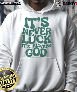Man wearing a 'Good It's Never Luck, It's Always God' hoodie, showcasing faith-inspired fashion in a casual setting.
