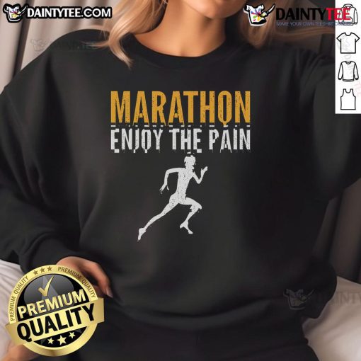 Runner wearing 'Enjoy The Pain' sweatshirt at a half marathon, showcasing determination and passion for marathon running.