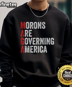Anti-Trump political sweatshirt featuring 'Good Morons Are Governing America' design, perfect for expressing dissent.