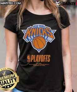 Excited New York Knicks fans in 2025 NBA Playoffs wearing 'Fanaticity' tee celebrating an alley-oop moment.