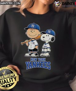 Good New York Yankees Charlie Brown and Snoopy baseball cartoon fan sweatshirt featuring playful sports design.