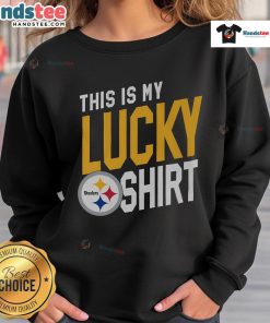 Person wearing a lucky Pittsburgh Steelers sweatshirt, showcasing team spirit and style on game day.