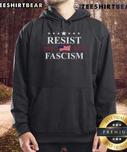 Protestor wearing 'Good Resist Fascism No Kings' hoodie during an anti-fascism rally, promoting unity against oppression.