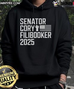 Senator Cory Booker wearing a 'Cory Filibooker' New Jersey hoodie, advocating passionately during a filibuster.