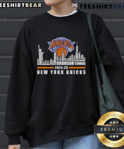 New York Knicks players' names sweatshirt featuring vibrant city skyline design for 2024-25 season.