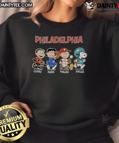 Good Snoopy and Friends fan sweatshirt featuring Philadelphia sports team logo, perfect for game day style.