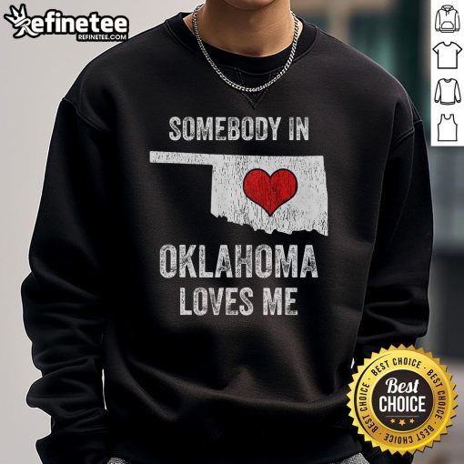 Cozy 'Good Somebody In Oklahoma Loves Me' sweatshirt in a casual setting, perfect for showing Oklahoma pride and comfort.