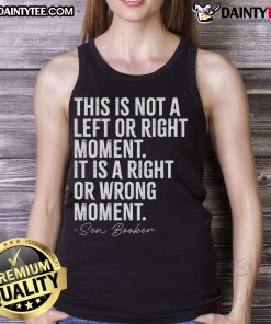 Senator Cory Booker wearing a tank top with 'Good-This-Is-Not-A-Left-Or-Right-Moment' slogan at an event.