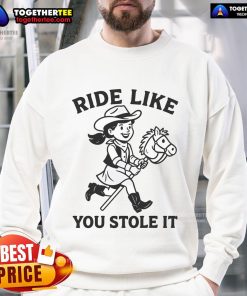 Happy cowgirl wearing a 'Hobby Horse Ride Like You Stole It' sweatshirt, enjoying her hobby horsing adventure outdoors.