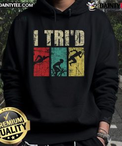 Happy triathlete wearing a retro vintage hoodie, showcasing swim, run, and bike elements of the triathlon lifestyle.
