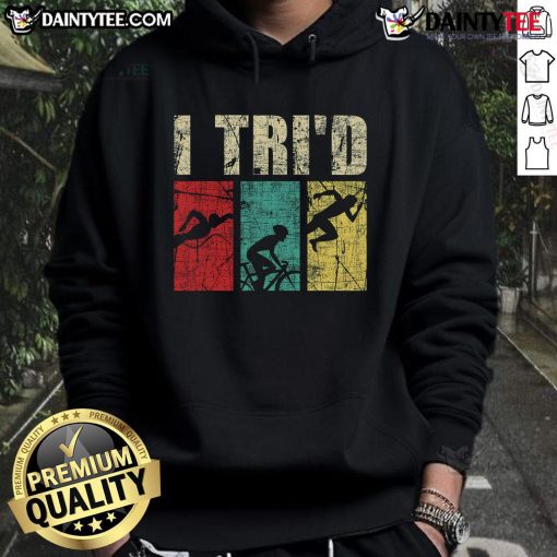 Happy triathlete wearing a retro vintage hoodie, showcasing swim, run, and bike elements of the triathlon lifestyle.
