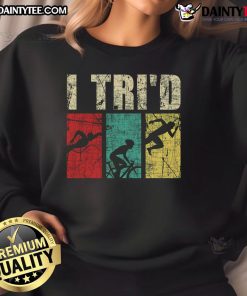 Happy retro vintage triathlon sweatshirt featuring a triathlete swimming, running, and biking design.