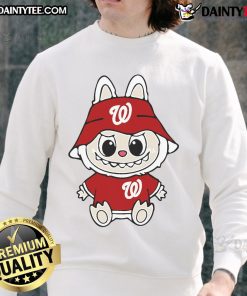 Happy Labubu wearing a Washington Nationals sweatshirt, showcasing team spirit and vibrant colors in a cheerful setting.