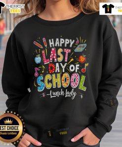 Alt Text: Happy last day of school lunch lady wearing a summer sweatshirt, celebrating with students in a cheerful cafeteria.