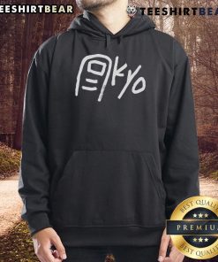 Happy Paolo wearing Tokyo Toe Kyo hoodie, showcasing vibrant design and urban style in a trendy city setting.