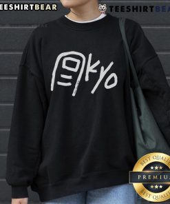 Happy Paolo wearing a Tokyo Toe Kyo sweatshirt, showcasing vibrant design and stylish urban fashion.