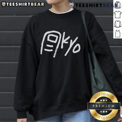 Happy Paolo wearing a Tokyo Toe Kyo sweatshirt, showcasing vibrant design and stylish urban fashion.