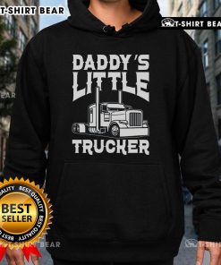Alt Text: Happy child wearing a 'Daddy's Little Trucker' hoodie, excitedly standing next to a colorful semi-truck.