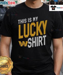 Alt Text: Happy fan wearing a 'This Is My Lucky T-Shirt' supporting the Washington Commanders at a game.