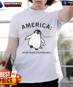 Hot America Were Taxing The Penguins T-Shirt featuring a playful penguin graphic and bold text design.