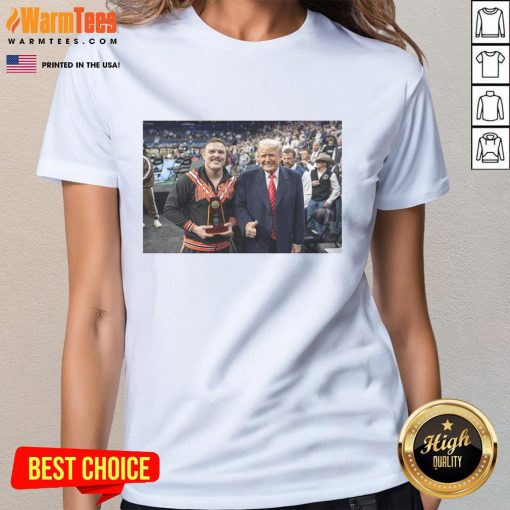 Wyatt Hendrickson, USA Wrestling legend, wearing a stylish ladies tee featuring Donald Trump as the best boss in business.