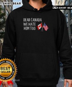 Alt Text: Anti-Trump hoodie featuring USA and Canada flags, expressing shared sentiments against Trump in bold design.