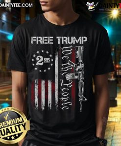 Alt Text: Hot Free Trump Supporter Pro Trump T-Shirt featuring American Flag design and 'We The People' slogan.