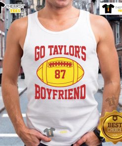 Alt Text: Hot Go Taylors Boyfriend 87 Football Tank Top displayed on a mannequin, featuring a sporty design and vibrant colors.