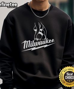 Hot Milwaukee sexy girl wearing a stylish sweatshirt, showcasing trendy urban fashion in a vibrant city setting.
