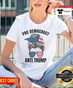Hot Pro Democracy Anti-Trump ladies tee with messy bun design and American flag graphic, perfect for patriotic activism.