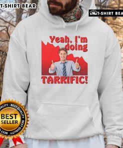 Person wearing a 'Hot-Yeah-Im-Doing-Tarrific' sarcastic thumbs up hoodie, showcasing a humorous crash graph design.