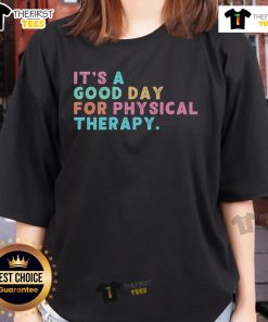 Women in a physical therapy session wearing 'Nice-A-Good-Day-For-Physical-Therapy' tees, promoting wellness and recovery.