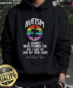 Mom wearing a 'Nice Autism A Journey I Never Planned For' hoodie, showcasing strength and love for her child.