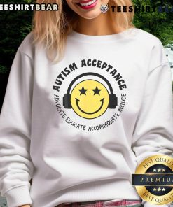 Boy wearing a 'Nice Autism Acceptance' sweatshirt, smiling joyfully, promoting autism awareness and acceptance.