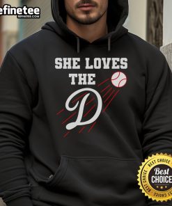 Stylish woman wearing a 'Nice Baseball She Loves The D' Los Angeles hoodie, showcasing urban fashion and team spirit.