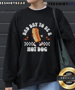 Festive 4th of July sweatshirt with a checkered design, featuring the phrase 'Bad Day to Be a Hot Dog'.