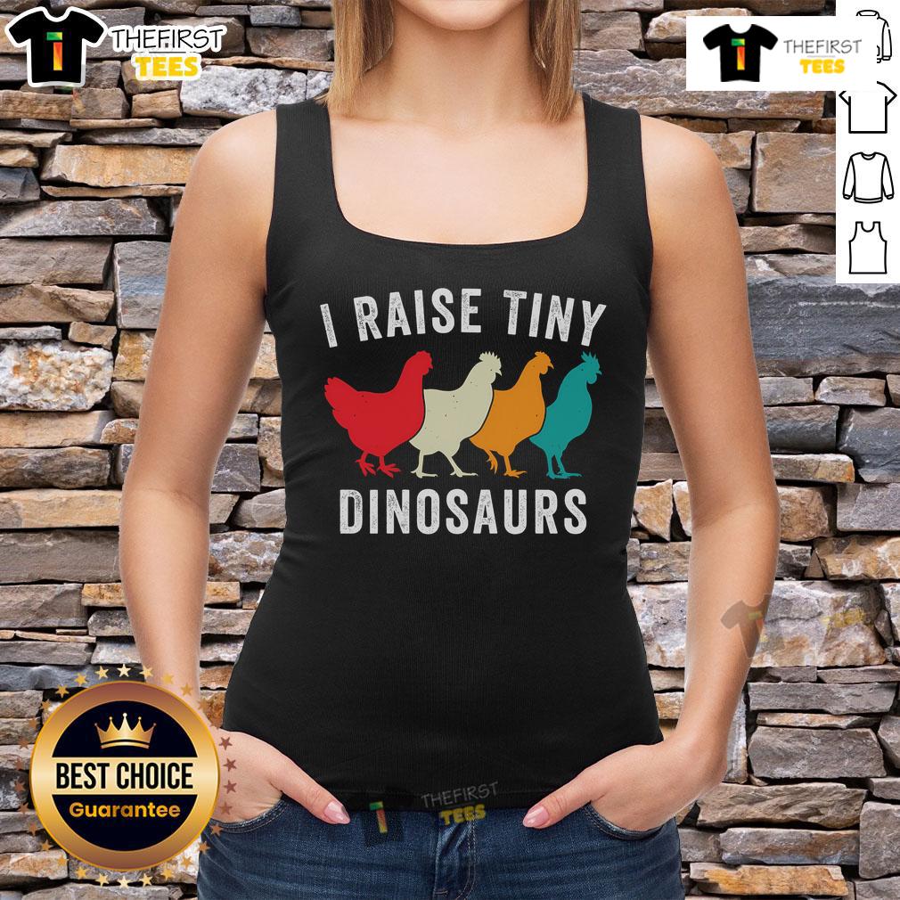 Nice Chickens I Raise Tiny Dinosaurs Backyard Chickens Homestead Chicken Lover Tank Top Chickens in the backyard with a tank top reading 'I Raise Tiny Dinosaurs' for chicken lovers and homesteaders.