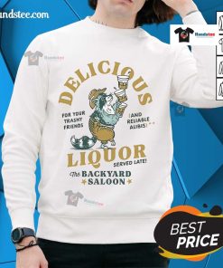 Nice Delicious Liquor Raccoon sweatshirt in a backyard saloon setting, perfect for cozy casual wear and animal lovers.