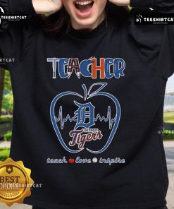 Detroit Tigers teacher sweatshirt with 'Teach, Love, Inspire' design and apple graphic, perfect for educators and fans.