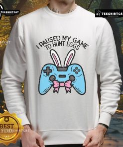 Cozy 'I Paused My Game to Hunt Eggs' sweatshirt for gamers celebrating Easter, perfect for game lovers.