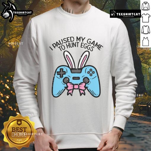 Cozy 'I Paused My Game to Hunt Eggs' sweatshirt for gamers celebrating Easter, perfect for game lovers.