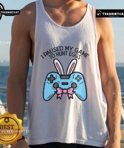 Nice Easter gamer paused game to hunt eggs, wearing a fun tank top for game lovers, perfect for spring celebrations.