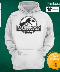 Dad wearing a dinosaur hoodie, enjoying a walk in the park, showcasing fun and playful fatherhood moments.