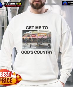 Alt Text: Cozy 'Nice Get Me To God's Country' sweatshirt displayed on a rustic wooden background, perfect for outdoor enthusiasts.